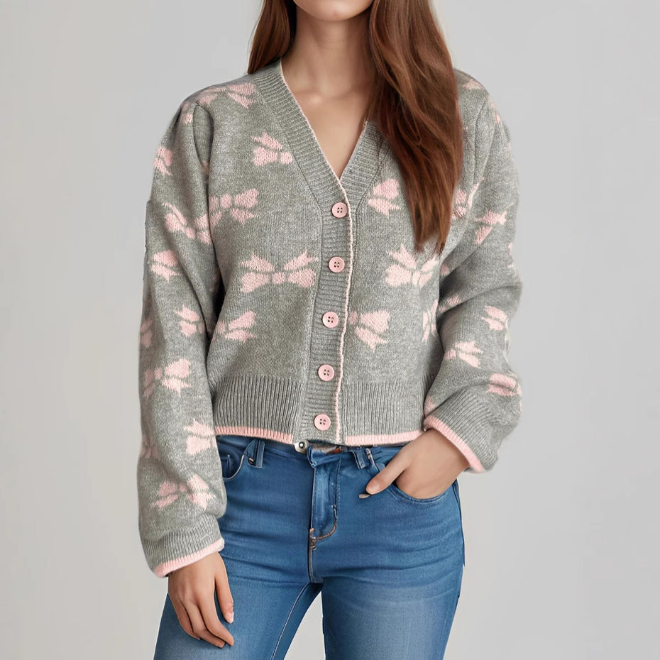 Damen Strickjacke mit verspieltem Schmetterlingsmotiv und dekorativen Knöpfen EB