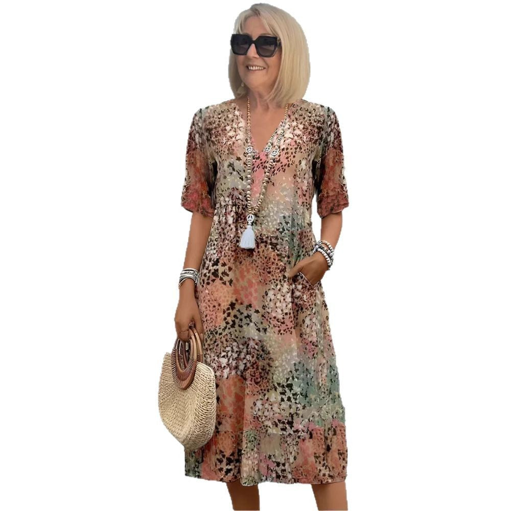 Damen Sommerliches Maxikleid mit floralem Design und praktischen Taschen EB