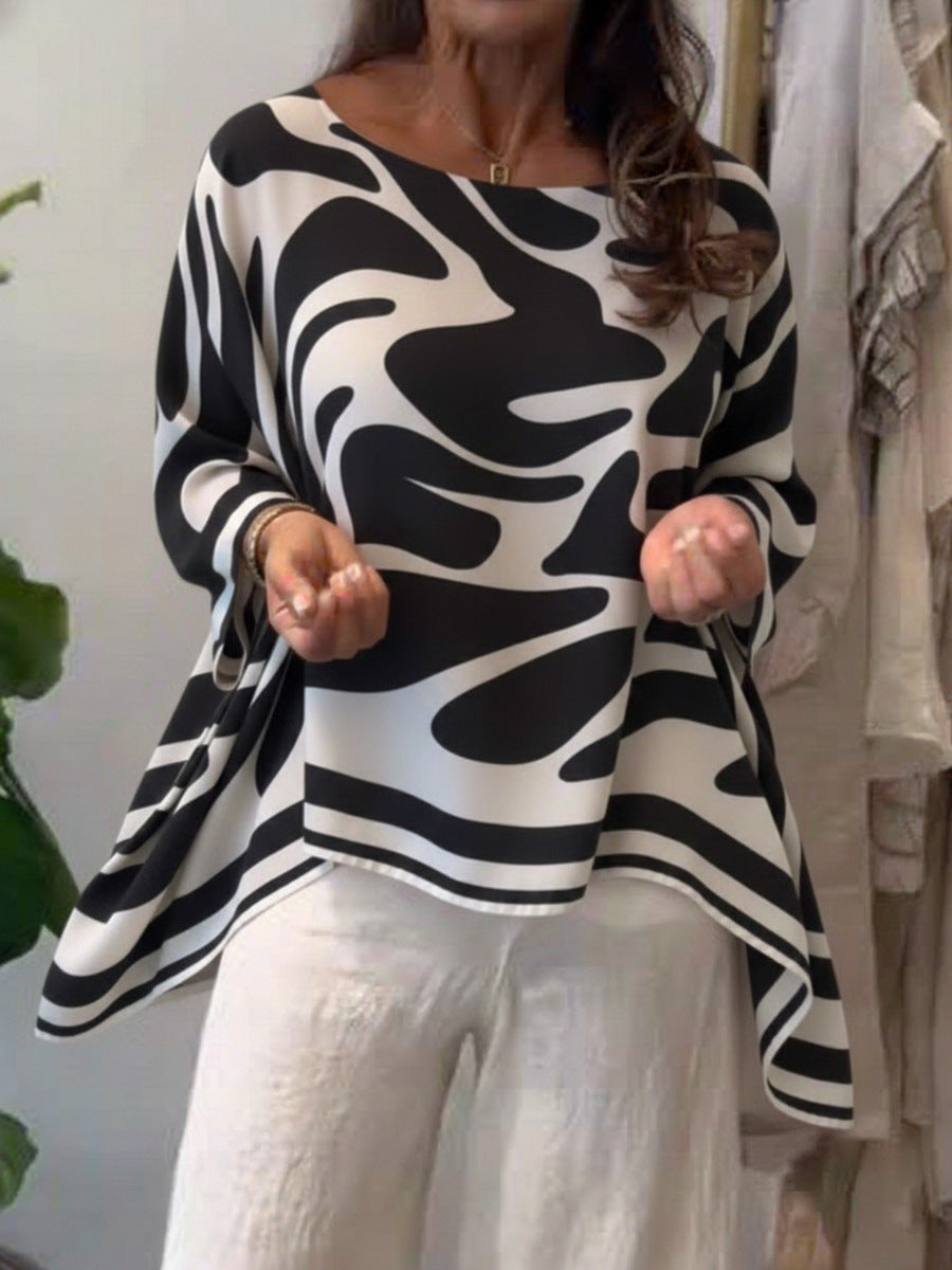Damen Oversize Sommerbluse mit abstraktem Print, Fledermausärmeln und asymmetrischem Saum EB