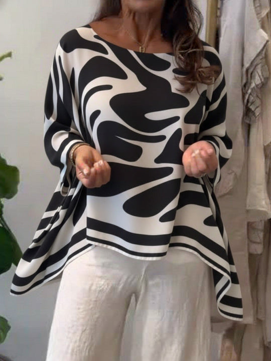 Damen Oversize Sommerbluse mit abstraktem Print, Fledermausärmeln und asymmetrischem Saum EB