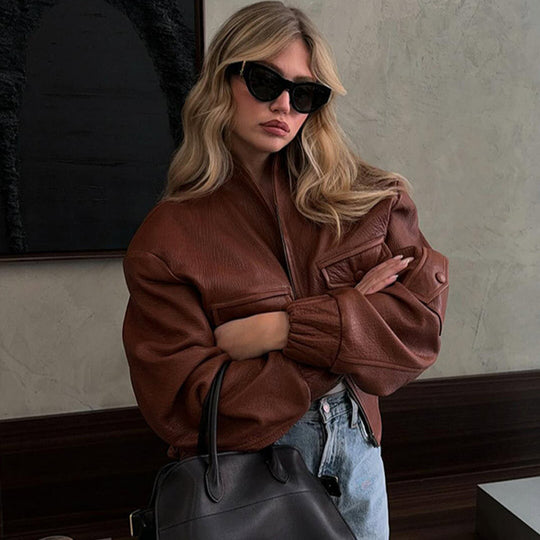 Damen Modische Kunstlederjacke mit einzigartigen Taschen und elastischen Rippabschlüssen EB