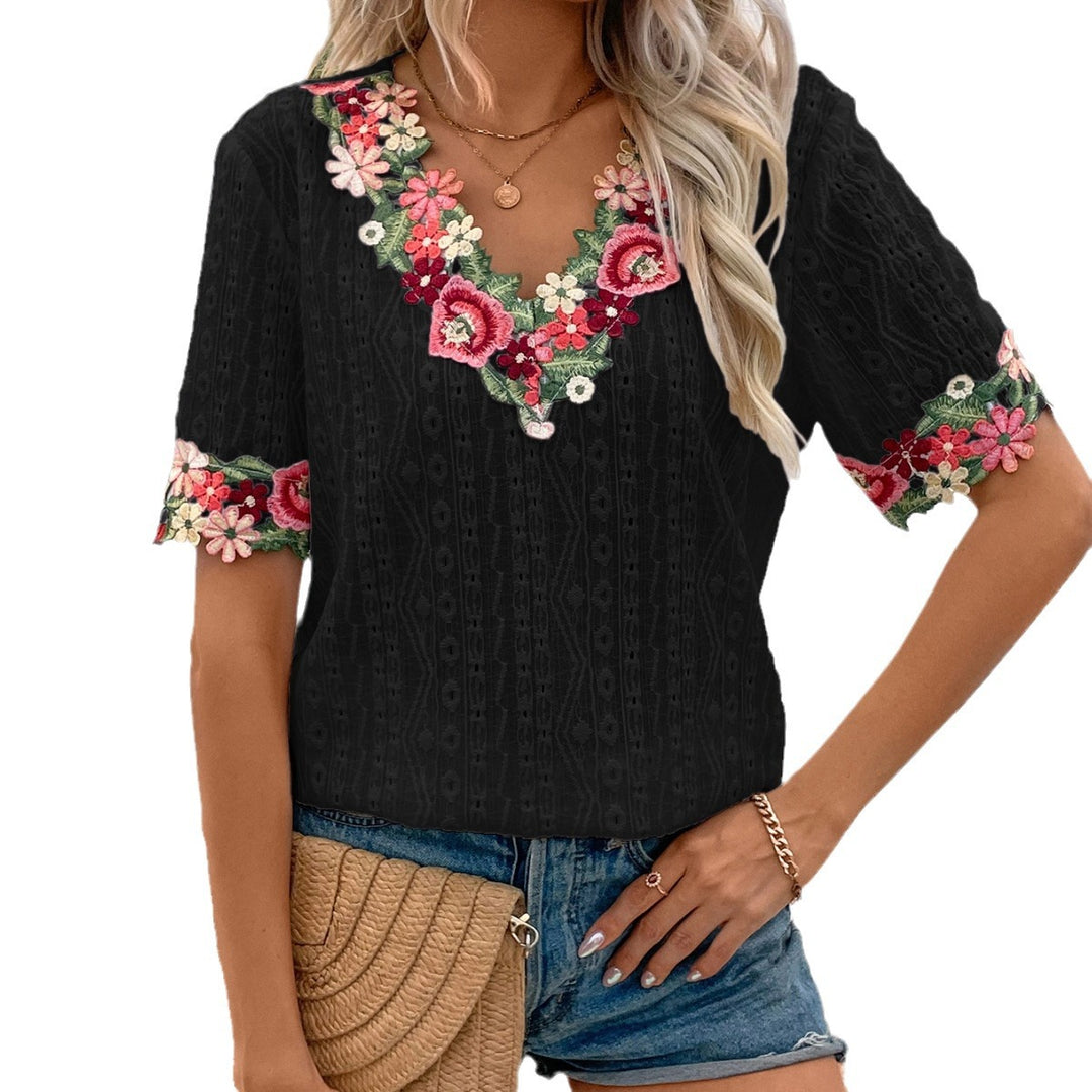 Damen Bluse mit floralen Stickereien und luftigen Ärmeln EB