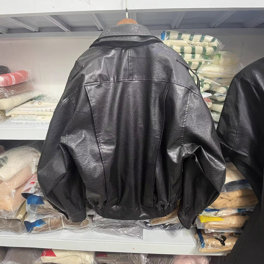 Damen modische Kunstlederjacke mit asymmetrischem Schnitt und dekorativem Gürtel EB