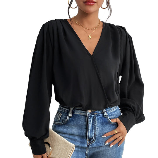 Damen Wickelbluse mit V-Ausschnitt, gepufften Schultern und elastischem Saum EB