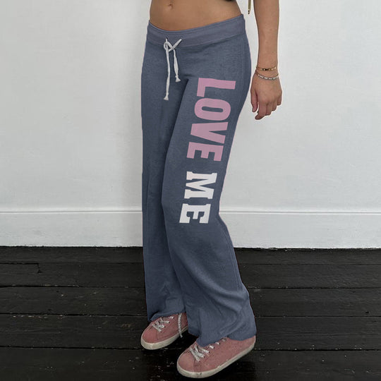 Damen Flared Jogginghose mit farblich abgesetztem Bund und modischem Schriftzug EB