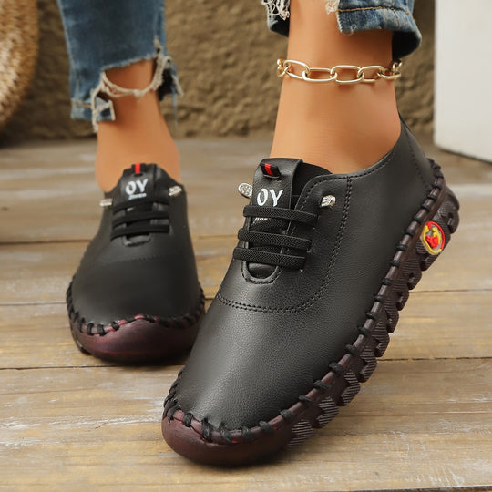 Damen Bequeme Lederoptik-Slipper mit flexibler Profilsohle und Mokassin-Naht EB