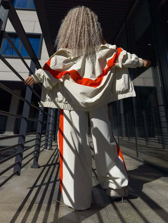 Damen leichte Oversize-Windbreakerjacke mit Kontrastpanelen, Tunnelzugbund und elastischen Bündchen Eichborn Berlin