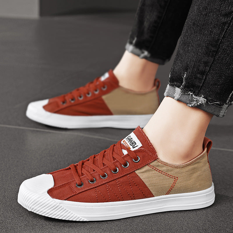 Unisex niedrige Canvas-Sneaker mit verstärkter Gummi-Zehenkappe und kontrastierenden Textilpaneelen EB