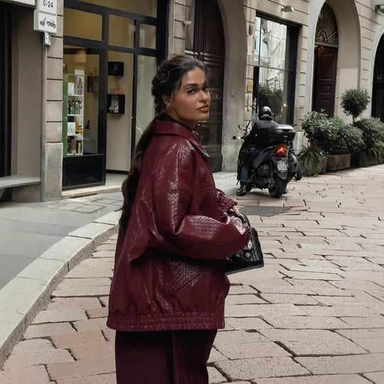 Damen modische Kunstlederjacke mit strukturiertem Design und elastischem Bund EB