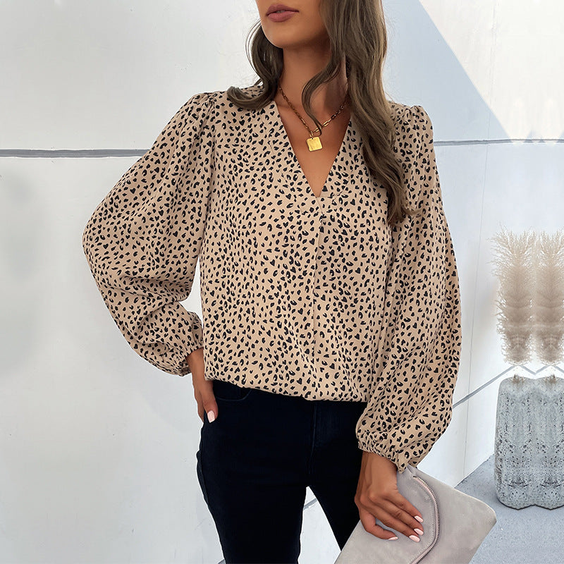 Damen Elegante Bluse mit Leoprint und voluminösen Ärmeln EB