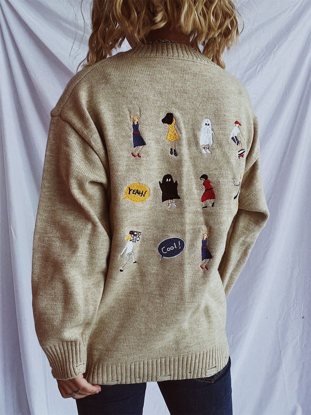 Damen pullover mit bunten Stickmotiven und lässigem Schnitt EB