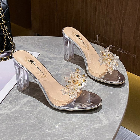 Damen elegante und durchsichtige Mules mit floralem Schmuckdetail EB