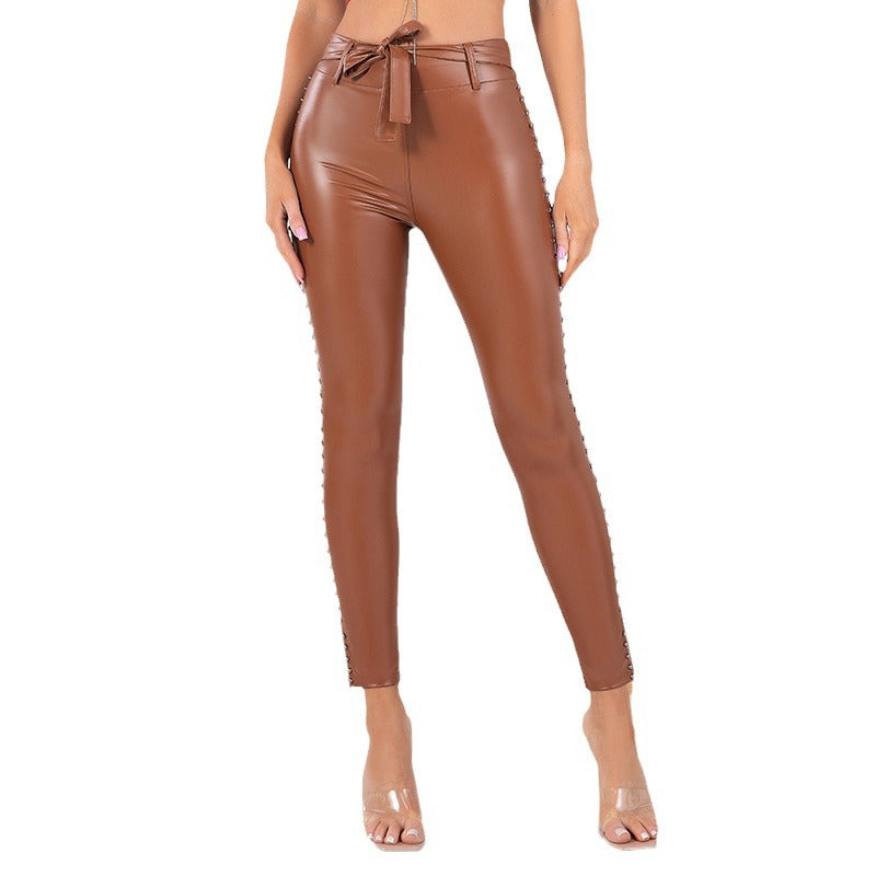 Damen Hochwertige Leggings im glänzenden look mit seitlichen Knopfdetails und hohem Bund EB