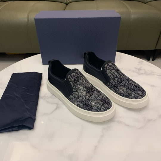 Damen Slip-On Sneakers mit modischem Schlangenleder-Design und praktischem Elastikeinsatz EB