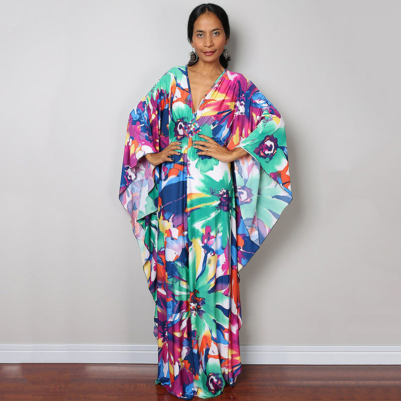 Damen Maxikleid mit kunstvollem Pfauenmuster und seitlichen Schlitzen Heidi Mode