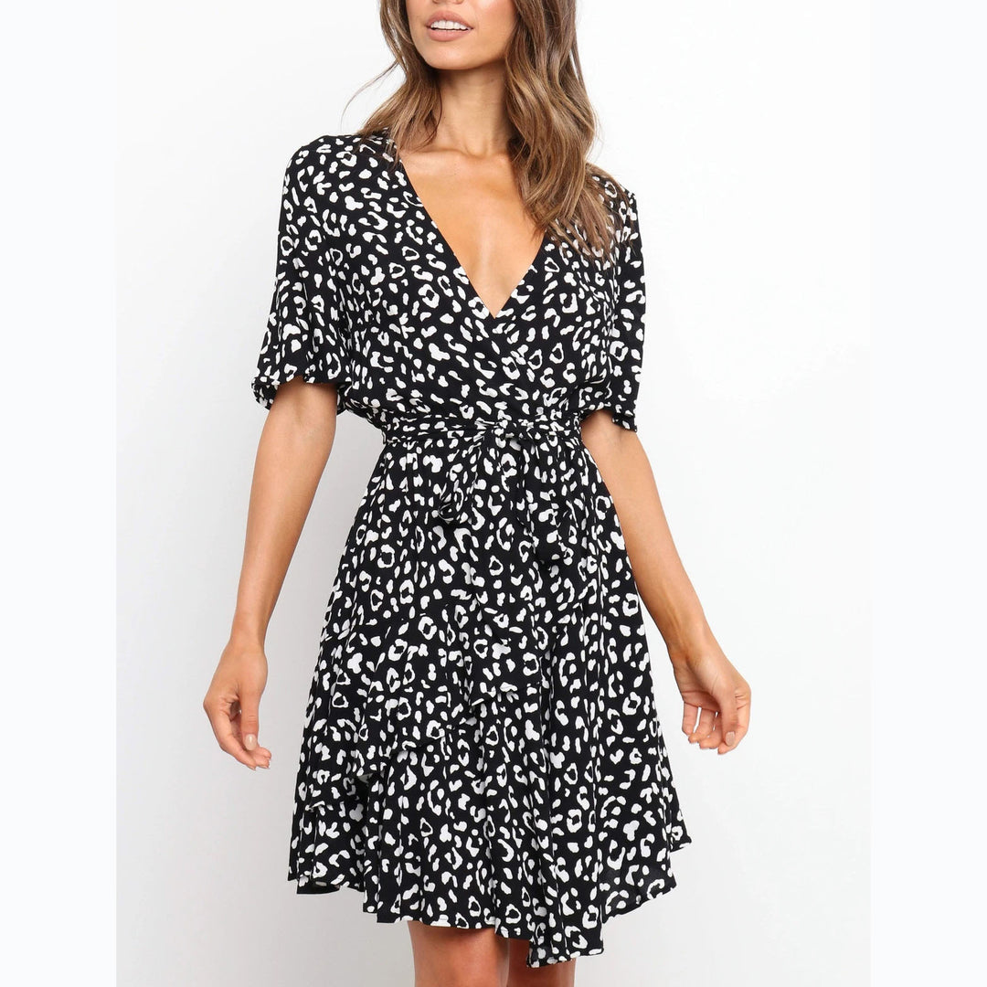 Damen Wickelkleid mit großzügigen Volant-Ärmeln und wunderschönem Animal-Print EB