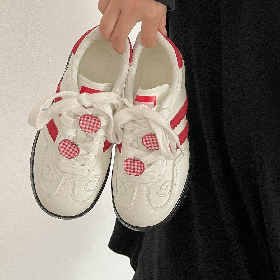 Damen Sneakers mit verspieltem Apfelmotiv und dämpfender Sohle EB