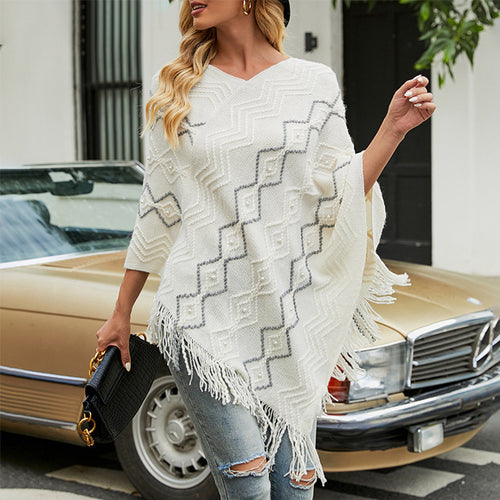 Damen eleganter Poncho mit auffälligem Strukturmuster und dekorativen Fransen EB