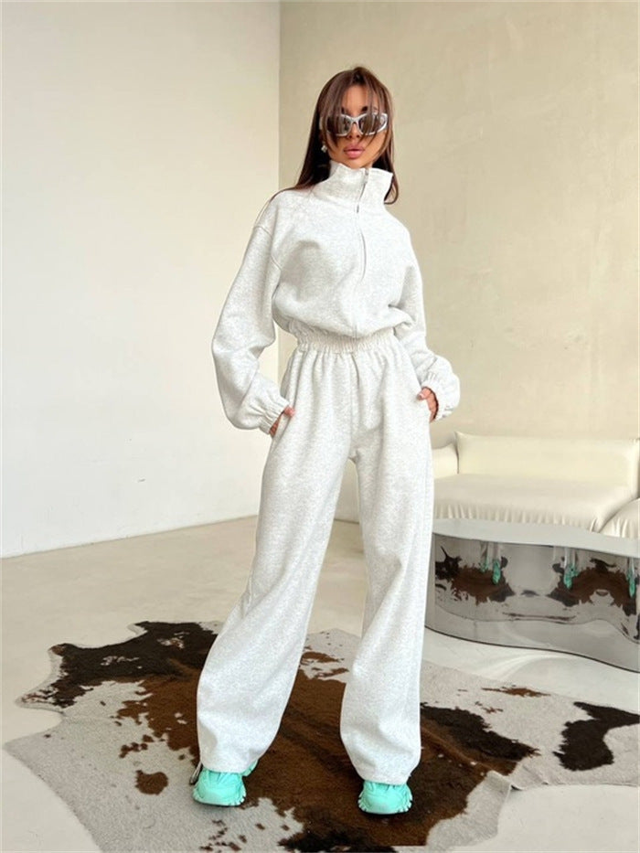 Damen Relaxed-Loungewear-Set mit Halbzip-Stehkragen und hochtaillierter Weitbein-Jogginghose Eichborn Berlin