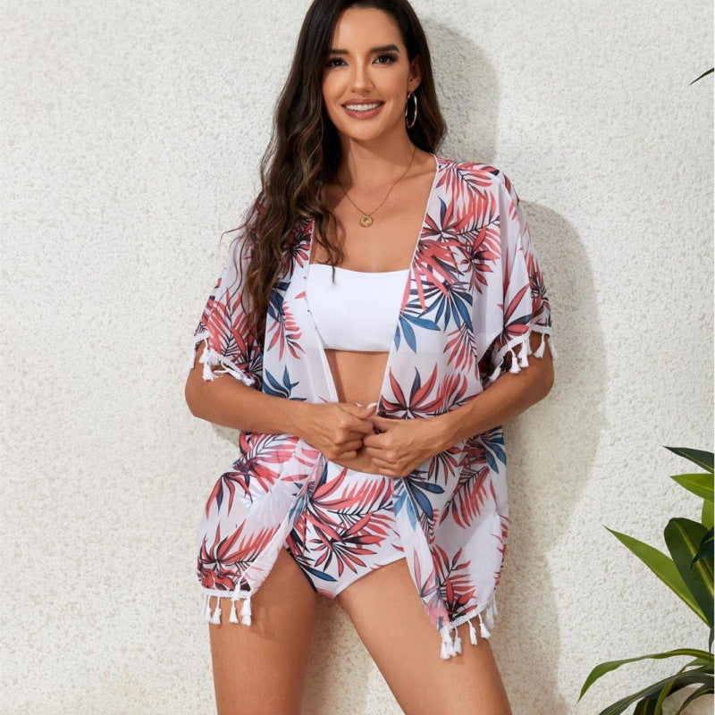 Damen Strandkleid mit floralem Design und fransenverziertem Überwurf EB