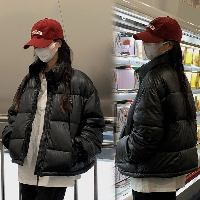 Damen Modische sowie isolierte Pufferjacke mit hochschließendem Kragen und seitlichen Reißverschlusstaschen EB