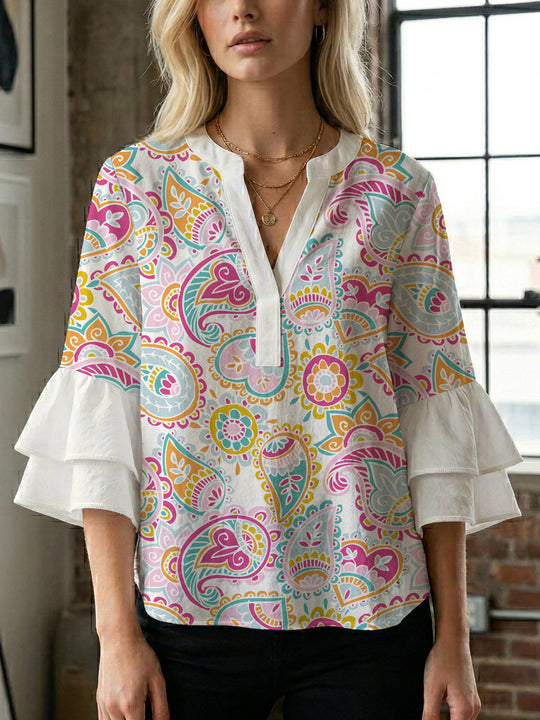 Damen Bluse mit voluminösen Flügelärmel und intensivem Blattmuster EB
