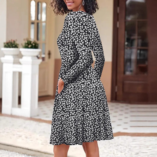 Damen Kleid mit floralem Muster und praktischen Taschen EB