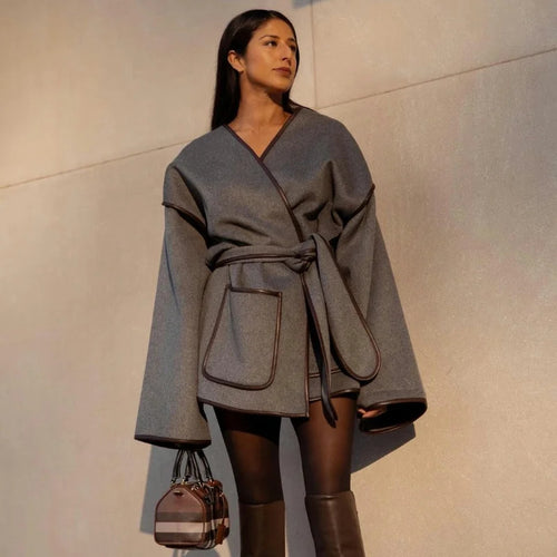 Damen Wickeljacke mit weitem Schnitt und praktischen Taschen EB