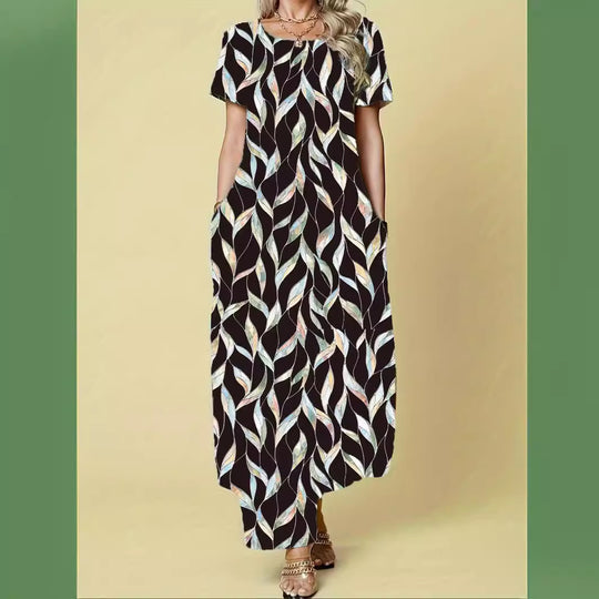 Damen Maxikleid mit lebhaftem Blattmuster und praktischen Taschen EB