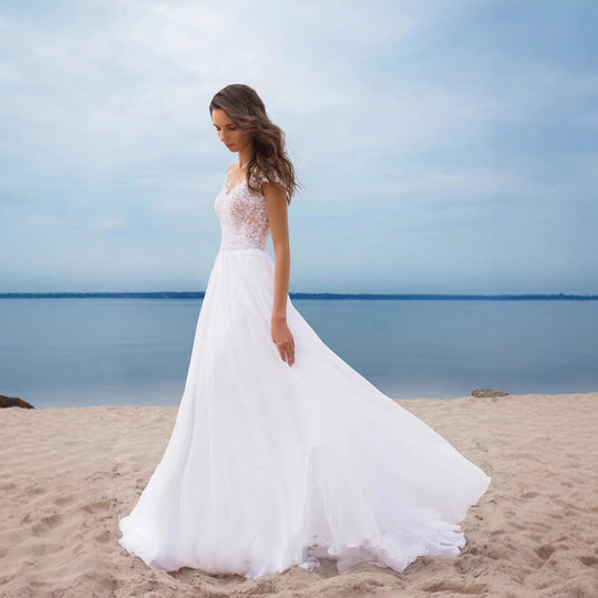 Damen Hochzeitskleid mit elegantem Spitzenoberteil und schwingendem Rock EB