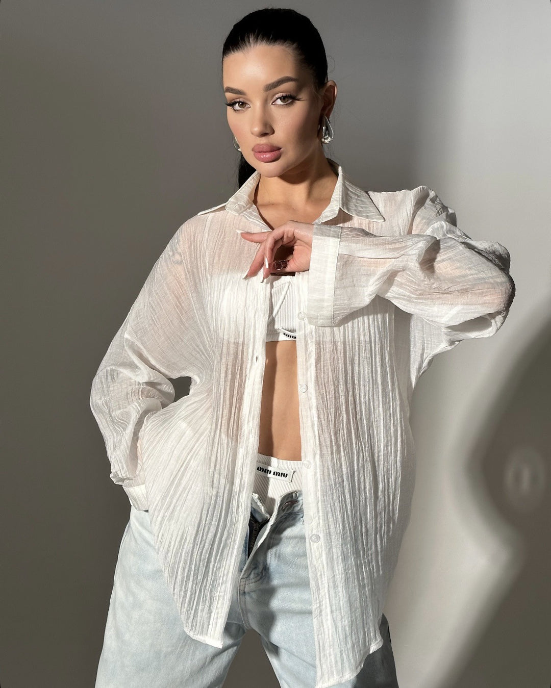 Damen lässige Hemdbluse mit oversized Schnitt und Knopfdetails EB