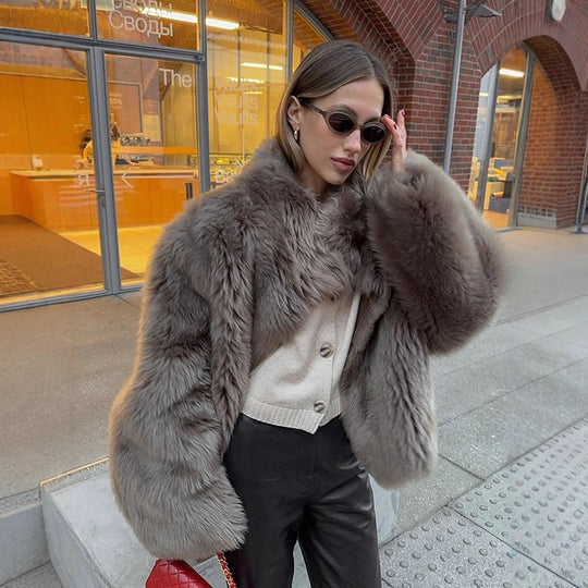 Damen luxuriöse Kunstfelljacke mit voluminösen Ärmeln EB