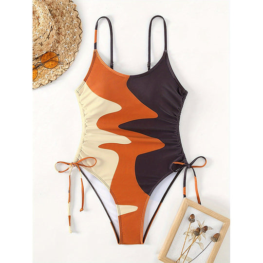 Damen Einteiler Badeanzug mit asymmetrischem Muster und verstellbarem Bindeband EB