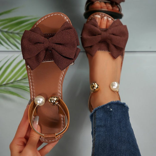 Damen Sandalen mit dekorativem Schleifenakzent und eleganten Perlendetails EB
