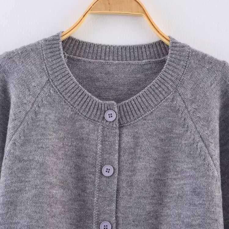 Damen cropped Strickjacke mit Knopfdetails und elastischem Bund EB
