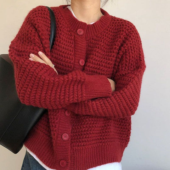 Damen Grobstrickjacke mit Knopfdetails und oversized Schnitt EB