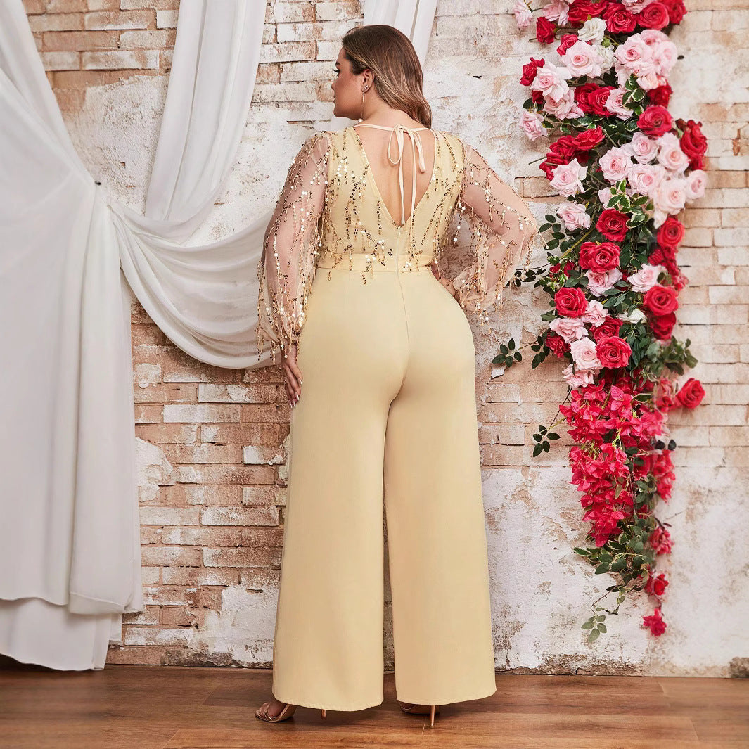 Damen Jumpsuit mit funkelnden Verzierungen und transparenten Ärmeln EB