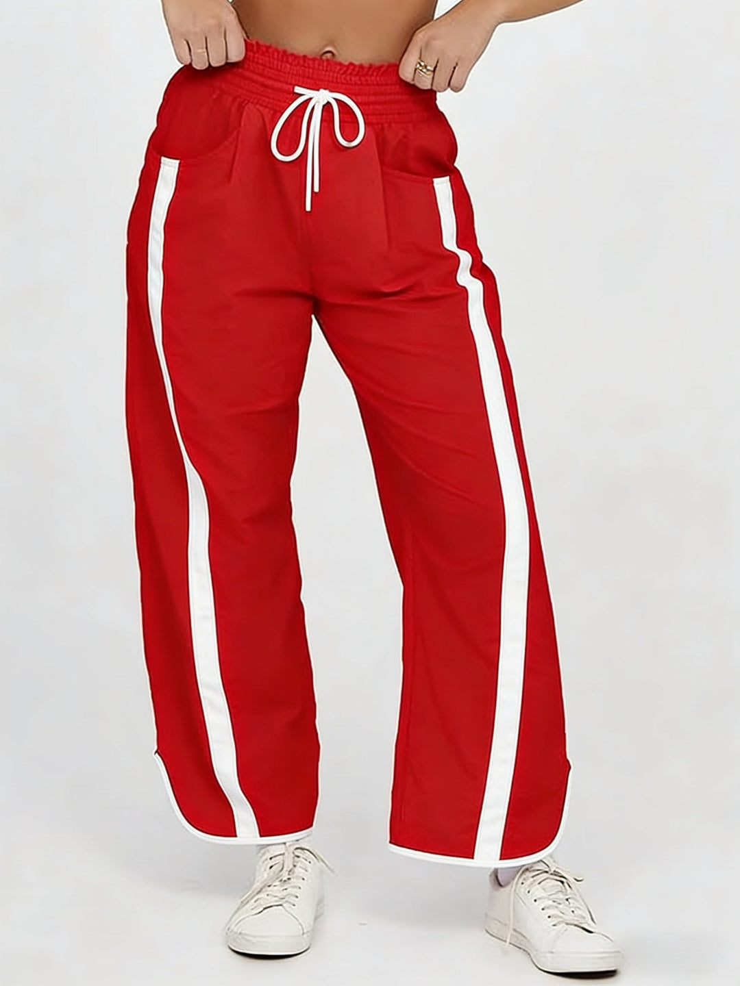 Damen nan relaxte Trackpants mit seitlichem Kontraststreifen, elastischem Smokbund und Eingrifftaschen EB