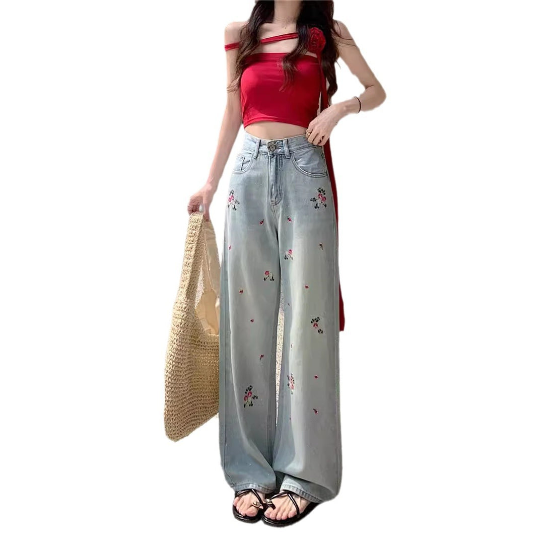 Damen Weite Jeanshose mit floralen Stickereien und hohem Bund EB