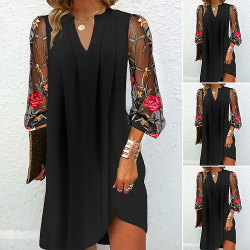 Damen Kleid mit transparenten Spitzenärmeln und floralem Design Heidi-Mode