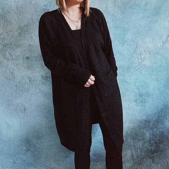 Damen lässige Strickjacke mit tiefem Schnitt und praktischen Taschen EB