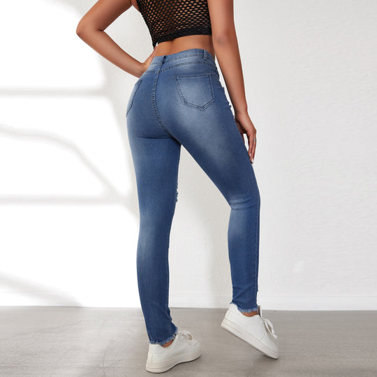 Damen Skinny Jeans mit animalischen Applikationen und Distressed-Effekten EB