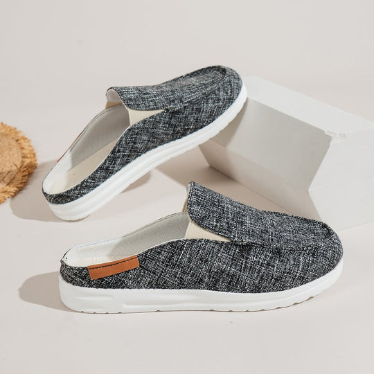 Damen  Slip-On Canvas‑Mules mit Kuhfleckenprint, gepolstertem Komfortfußbett und rutschfester Leichtsohle EB
