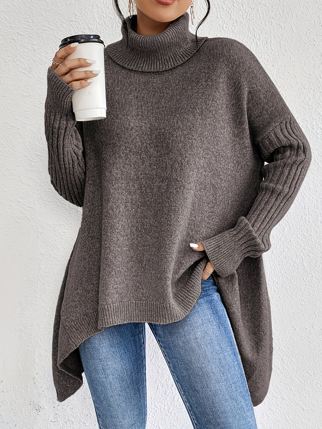 Damen nan Oversize Strickpullover mit hohem Rollkragen, gerippten Ärmeln und asymmetrischem Saum EB