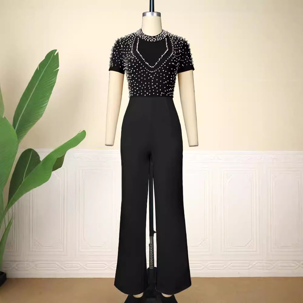 Damen eleganter Jumpsuit mit glitzernden Perlenakzenten EB