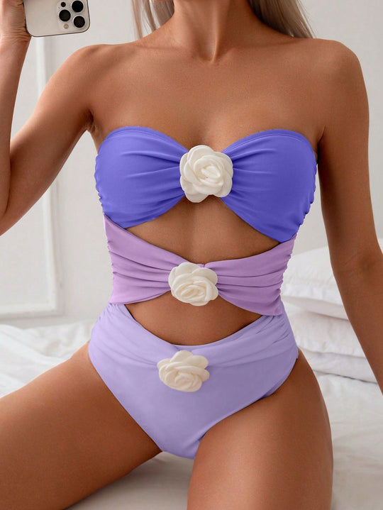 Damen Bandeau-Badeanzug mit eleganten Rüschen und floralen Akzenten EB