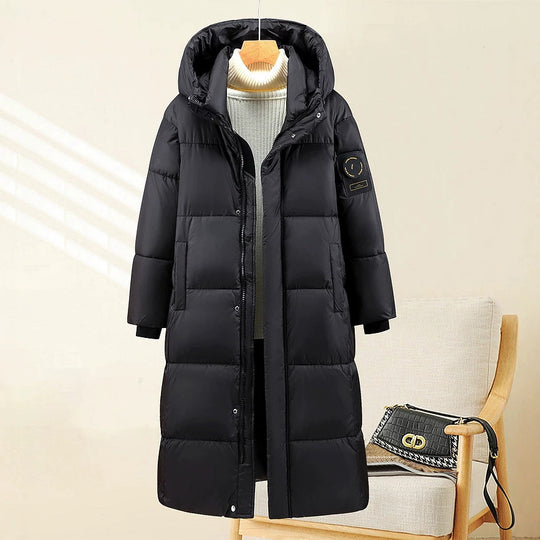 Damen nan extralang gesteppter Thermoparka mit ergonomischer Kapuze, innenliegenden Rippbündchen und verdeckter Frontblende EB