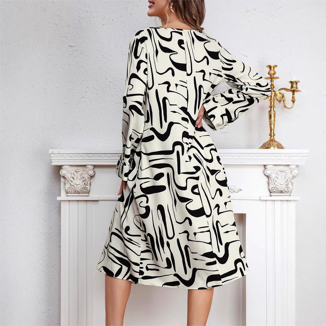 Damen Midikleid mit modernem Grafikdruck und V-Ausschnitt EB