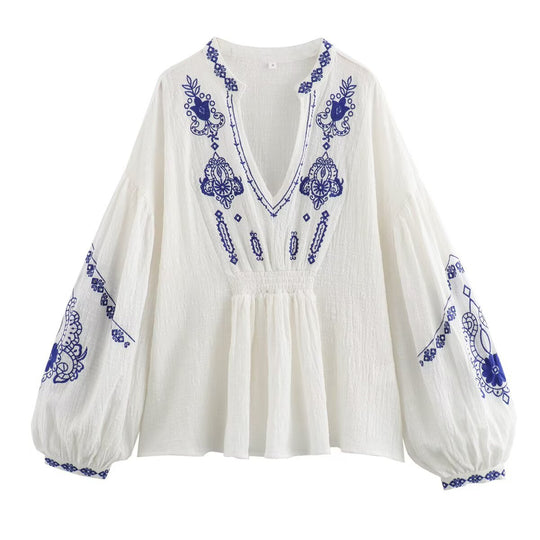 Damen Bluse mit verspieltem floralen Stickdesign und voluminösen Ärmeln EB