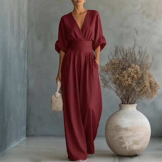 EB | Eleganter Ärmelloser Jumpsuit mit Tiefem V-Ausschnitt, Taillenbund und Weitem Bein